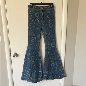 We The Free Blue Flare Jeans with Celestial Print